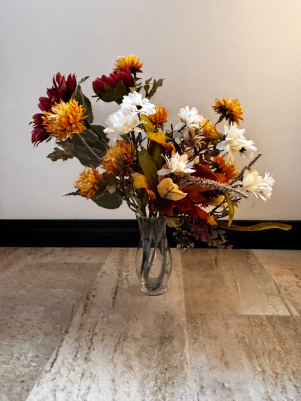 Assorted silk flowers in autumn/fall colours